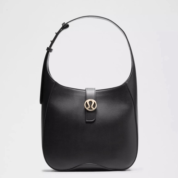 lululemon athletica Handbags - 🆕 NWT Lululemon 8L Leather Alternative Bag with Gold Logo Accent